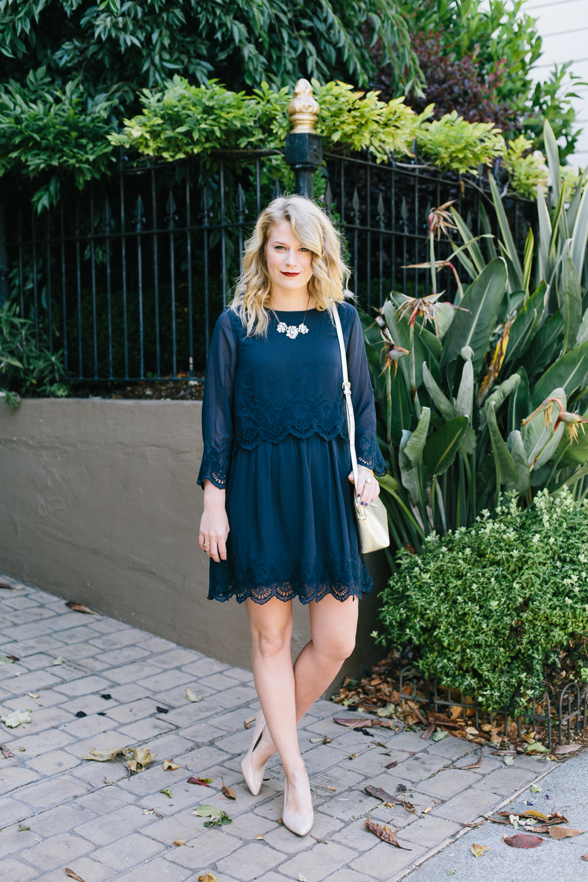 Double Layered Navy Dress from ASOS with Gold Kate Spade Bag.