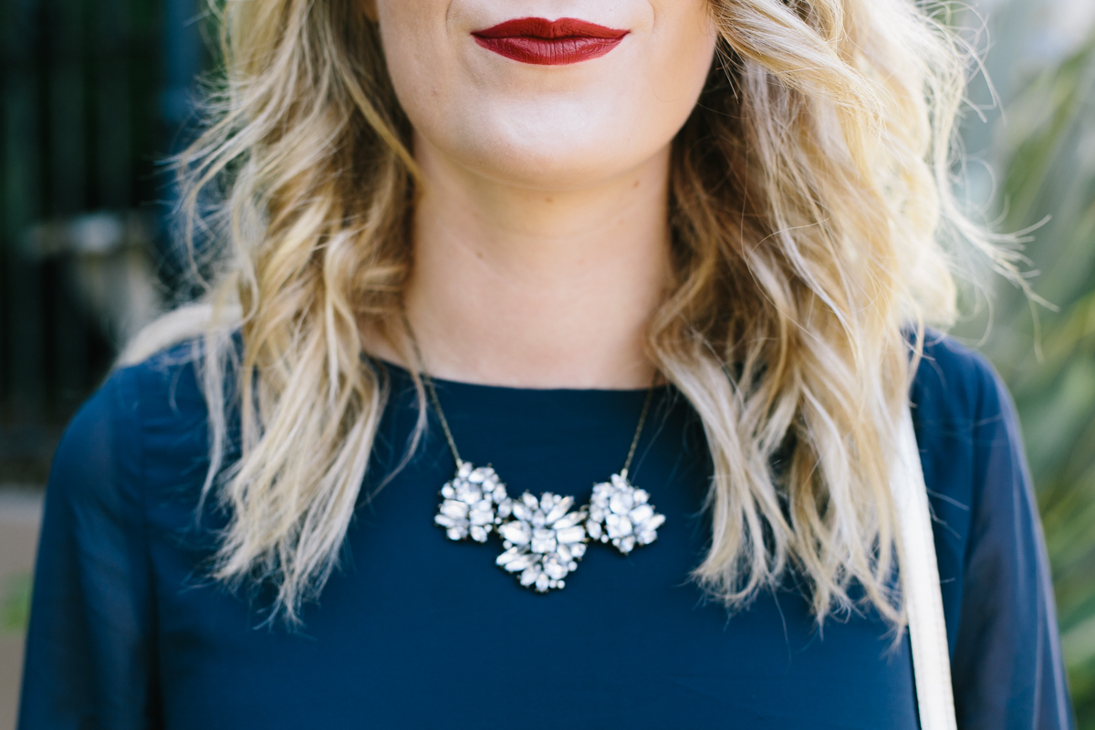 BaubleBar Necklace with Red Lipstick.
